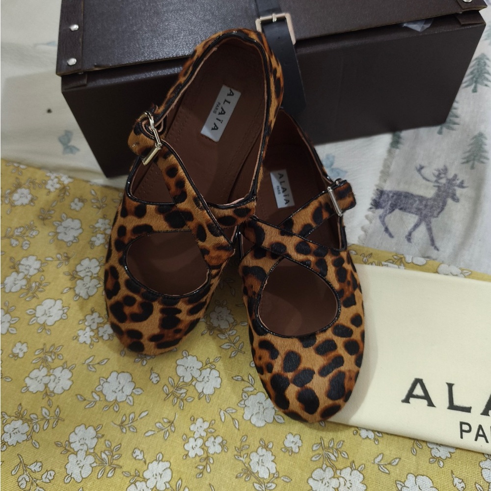 Alaia Leopard-Print Mary Jane Flats in Brown and Black